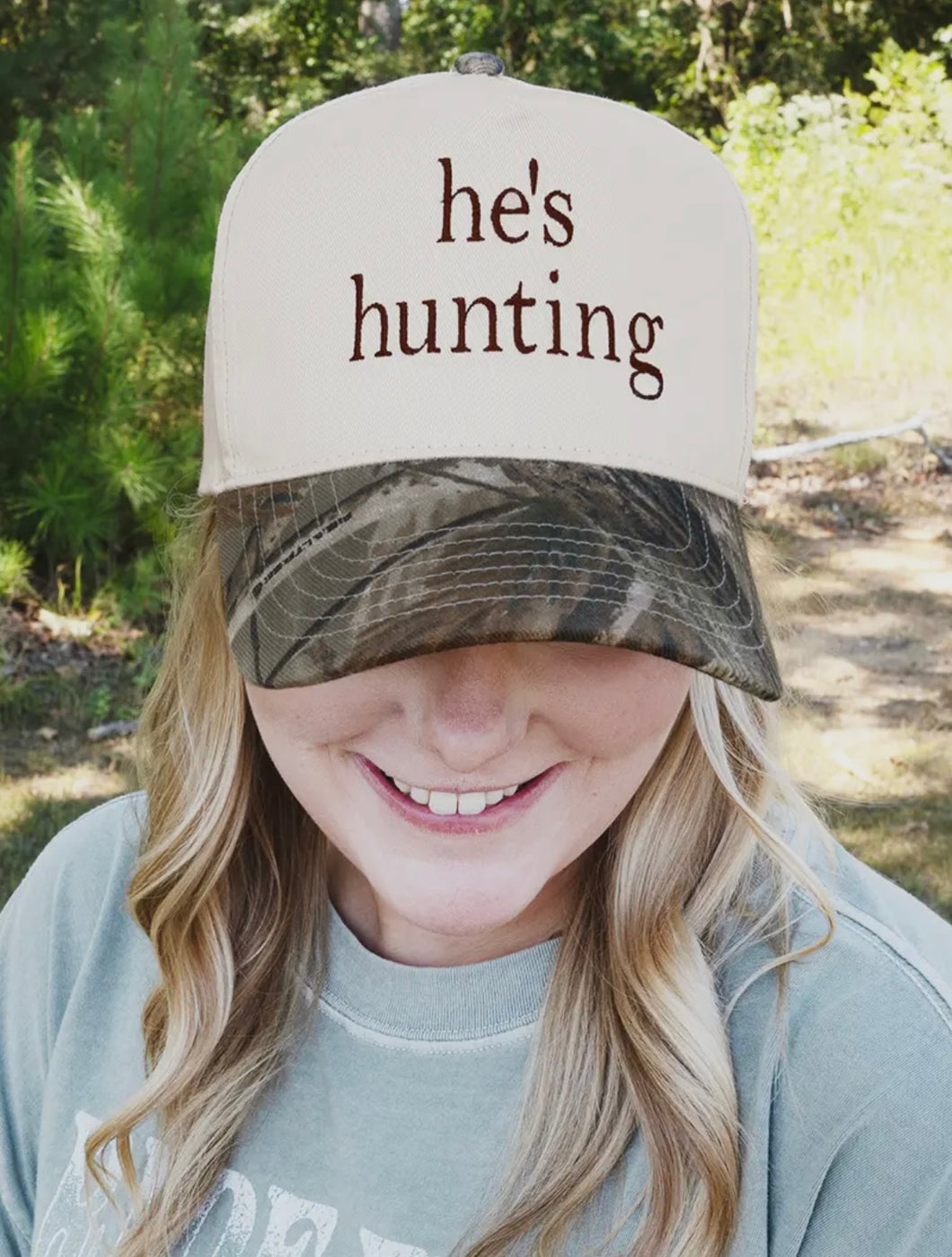 “He’s Hunting” Embroidered Camo Trucker Hat